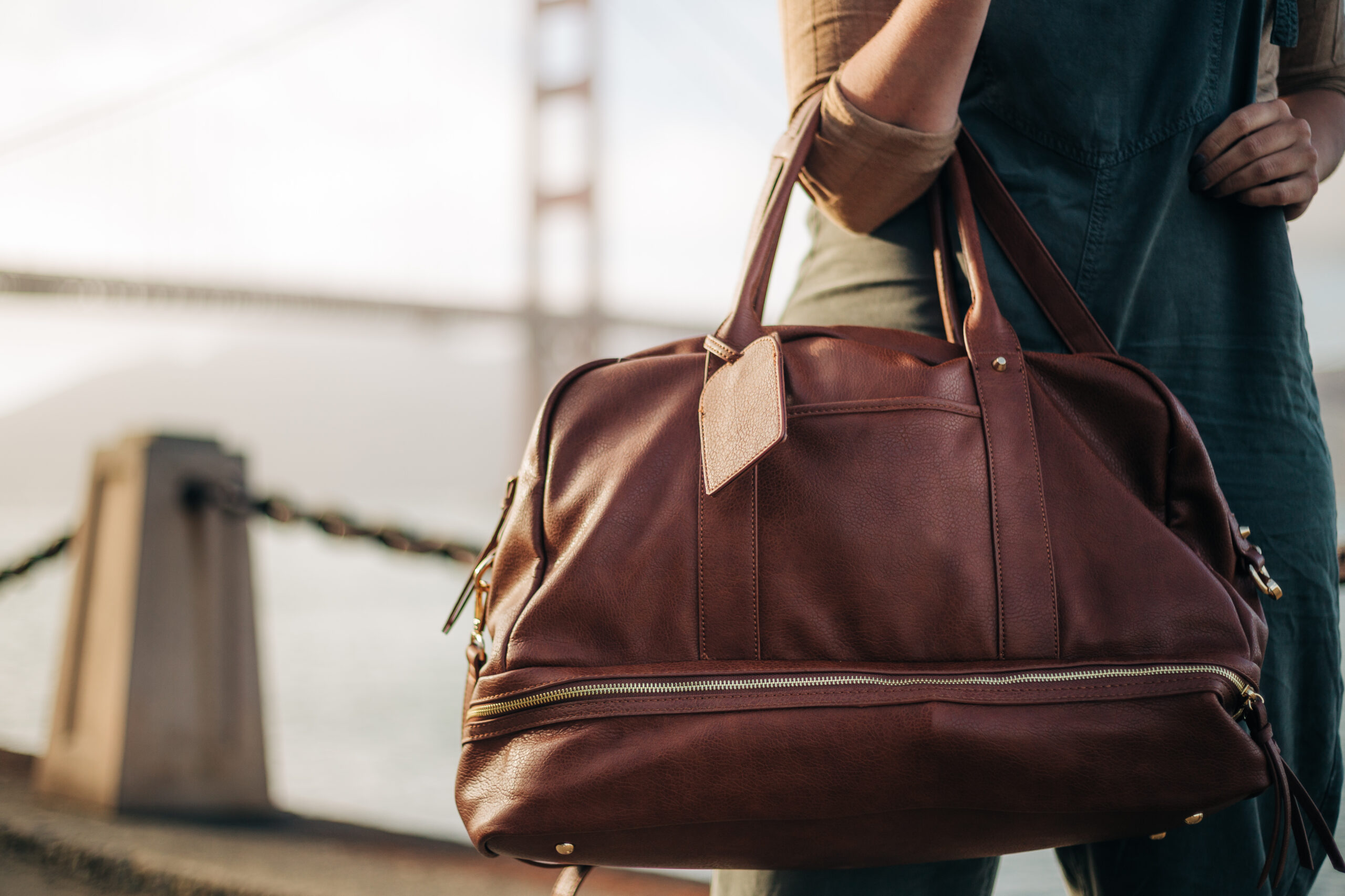 KatWalkSF at the golden gate bridge with the The Perfect Weekender from Sole Society.