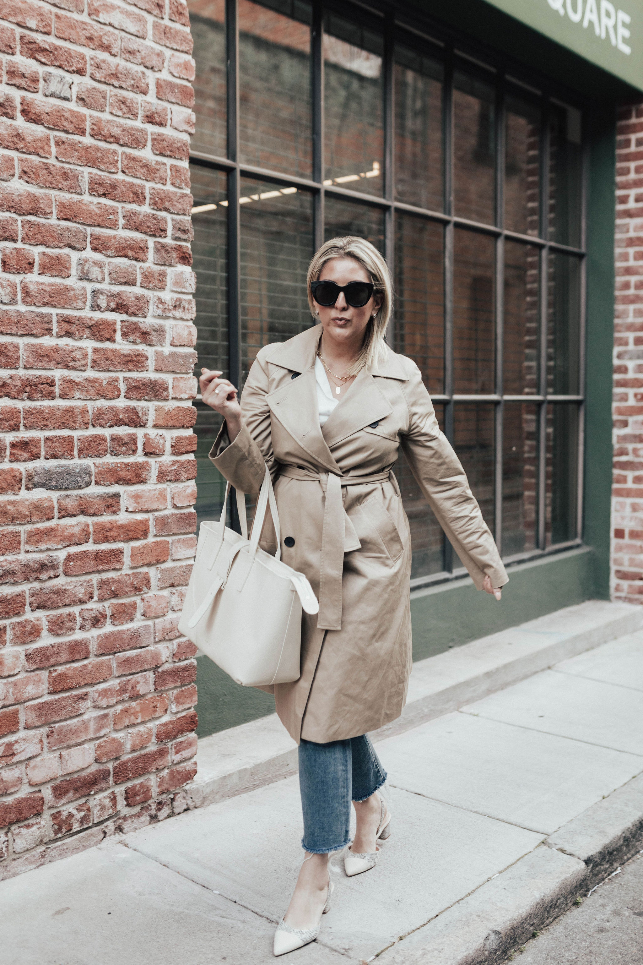 Style Inspired By Angelina Jolie, KatWalkSF wears an Everlane trench and SENREVE Voya tote
