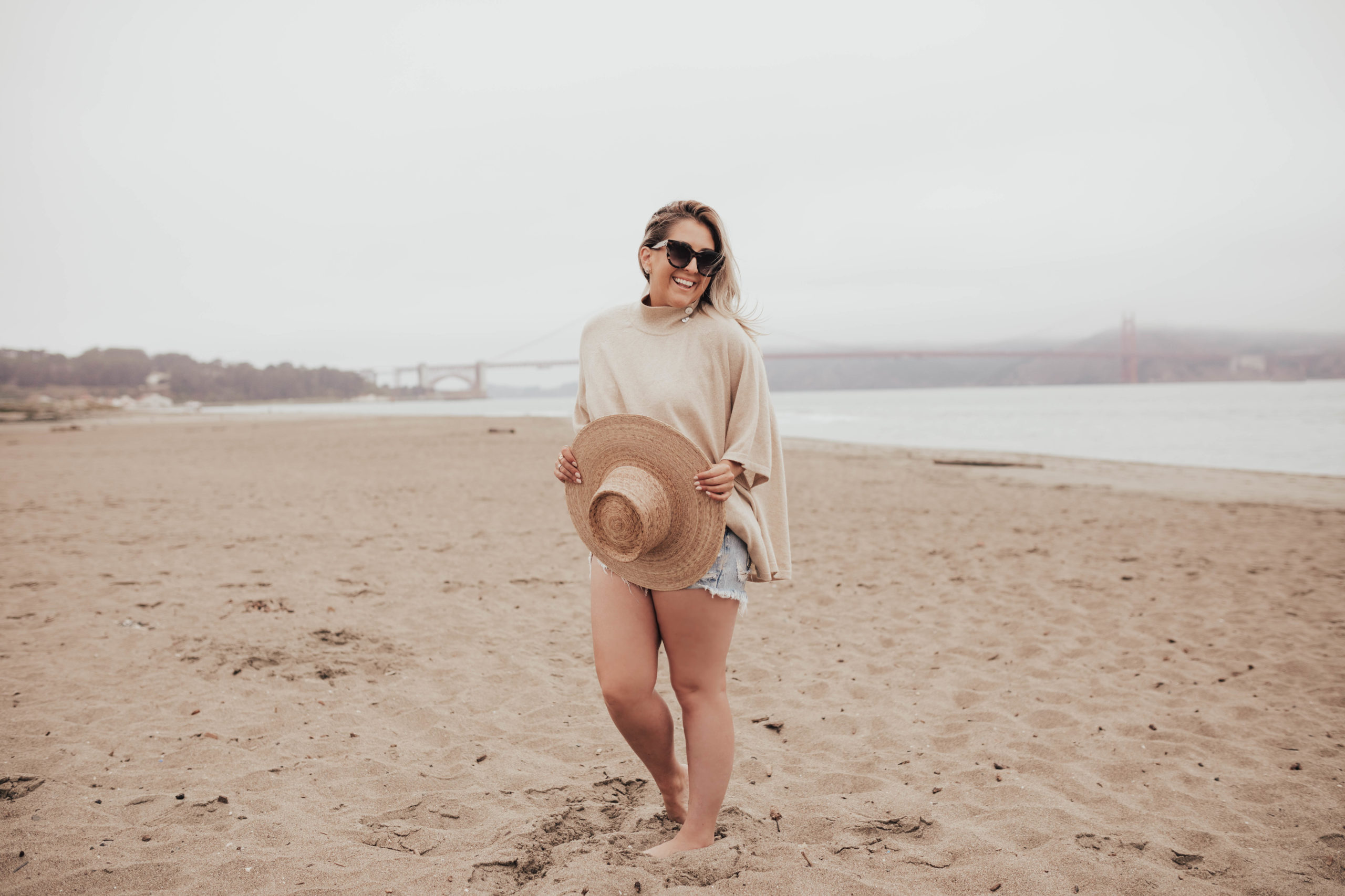 Senreve Cashmere Review, Senreve Capelet, AGOLDE parker shorts, Lack of Color Hat, KatWalkSF, Kat Ensign, San Francisco Beach, San Francisco Blogger