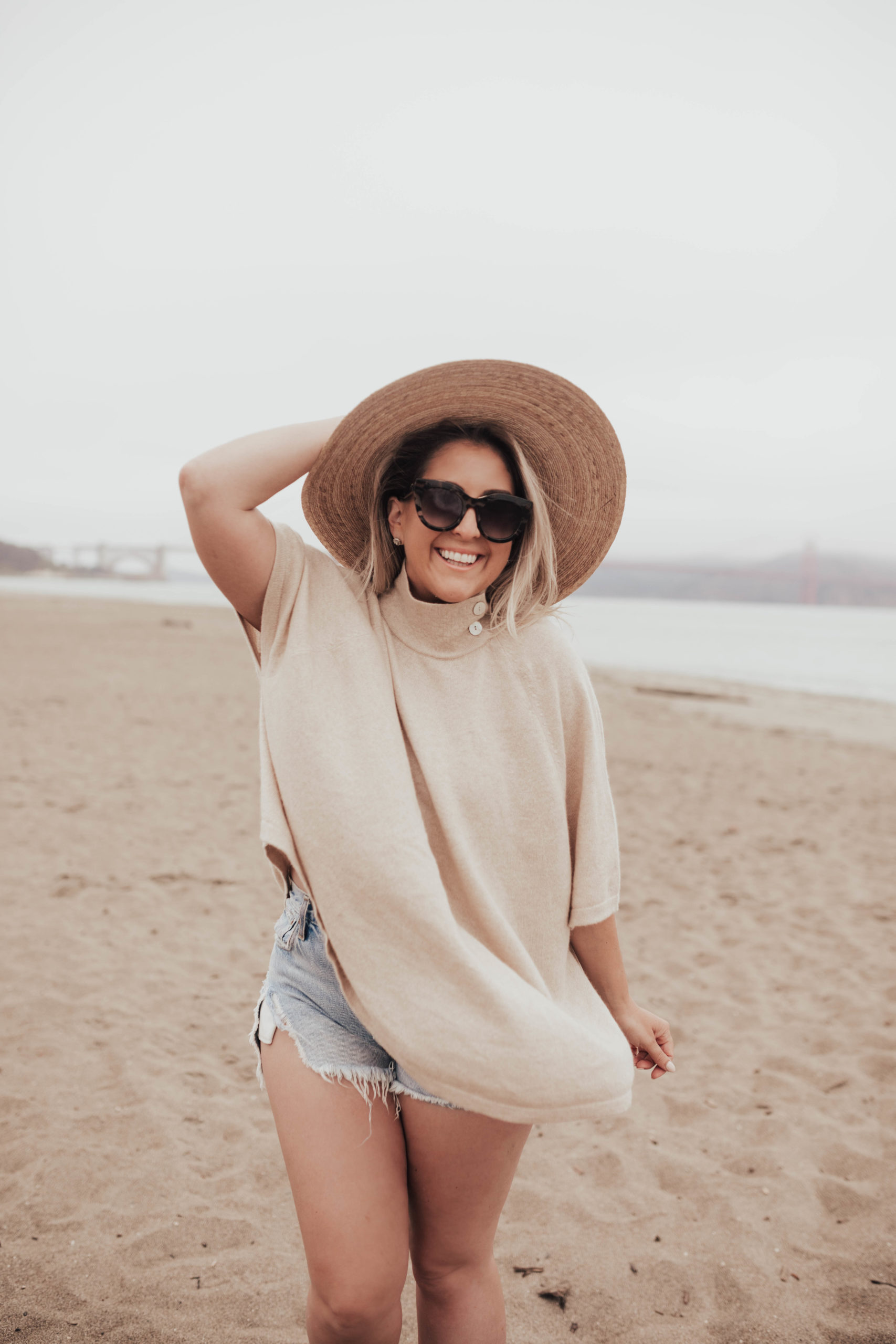 Senreve Cashmere Review, Senreve Capelet, AGOLDE parker shorts, Lack of Color Hat, KatWalkSF, Kat Ensign, San Francisco Beach, San Francisco Blogger