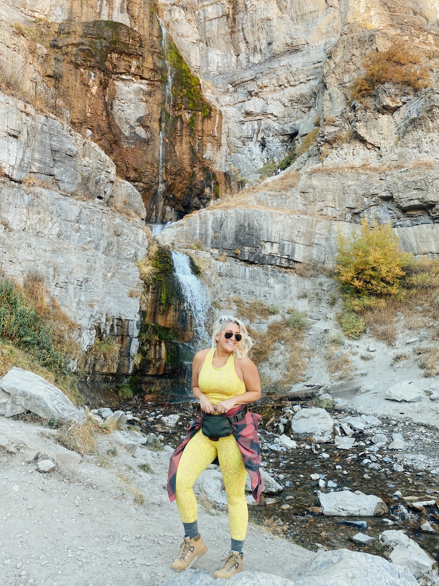 Fashion and lifestyle blogger KatWalkSF wearing Sweaty Betty and Forsake Hiking Boots at Stewart Falls in Utah
