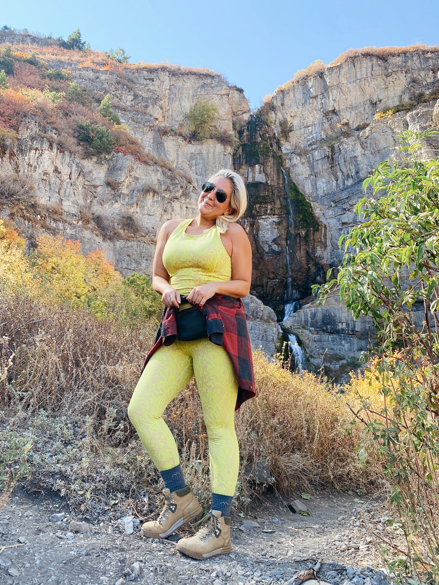 Fashion and lifestyle blogger KatWalkSF wearing Sweaty Betty and Forsake Hiking Boots at Stewart Falls in Utah