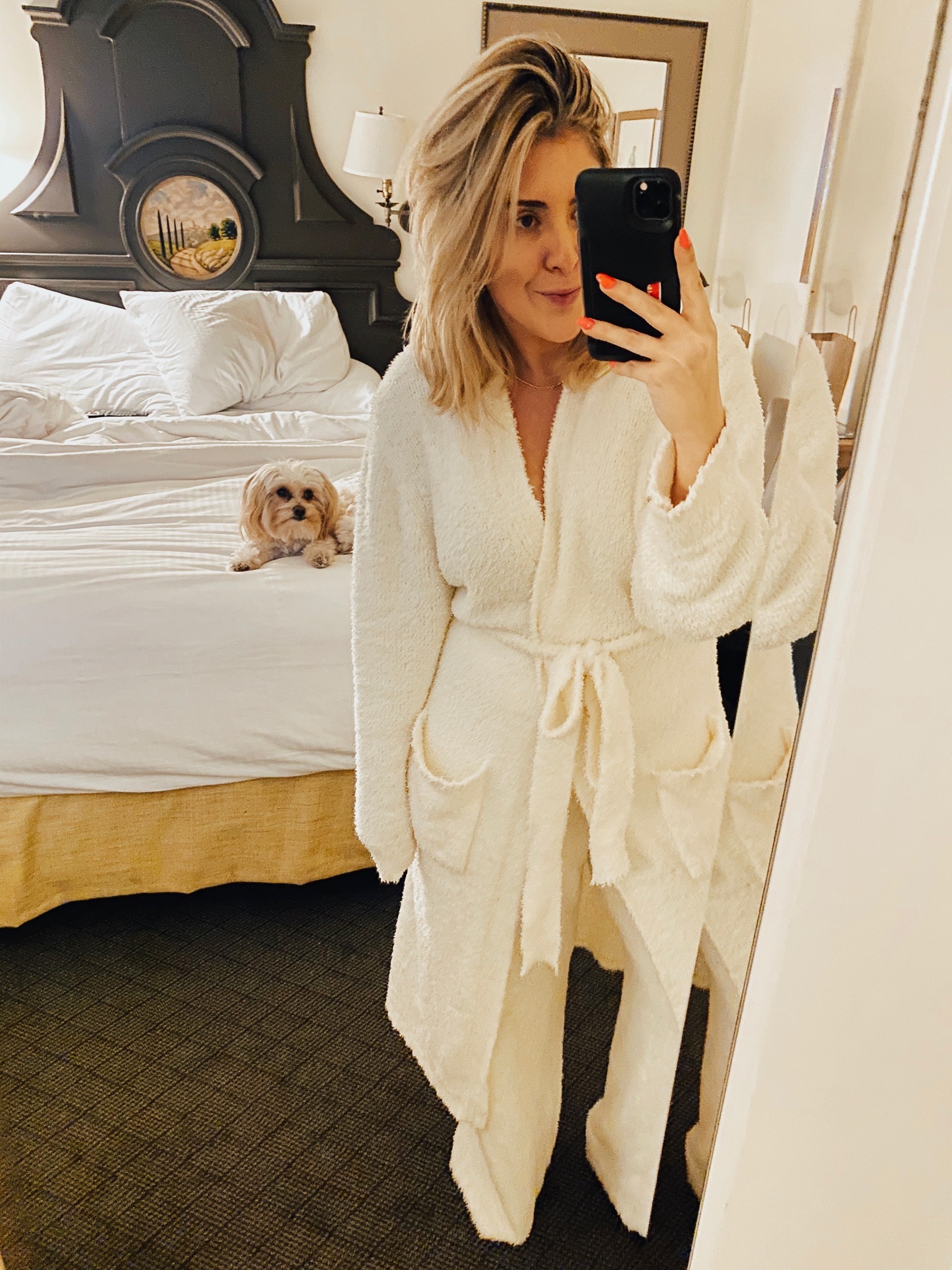 San Francisco Blogger Kat Ensign of KatWalkSF taking a mirror selfie at the Fairmont Sonoma in the Skims Cozy Collection